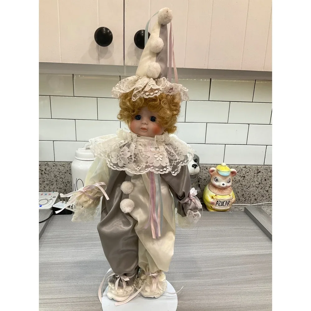 VINTAGE PORCELAIN DOLL IN CLOWN COSTUME